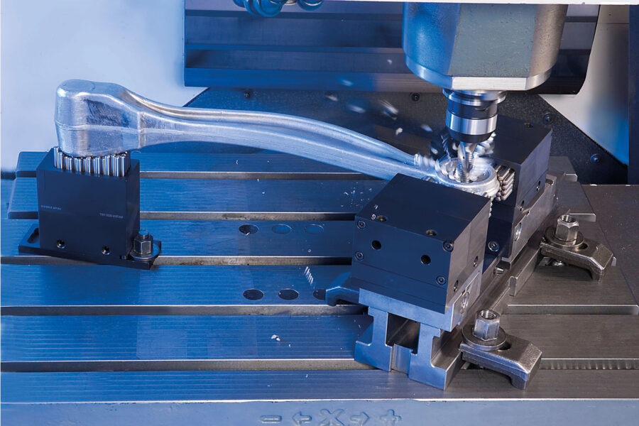 Cutting tool machining a Clamp